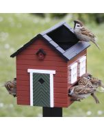 Vogelfutterspender mit Vogelbad rot kaufen. Dekorativer Futterspender mit 2,5 Liter Inhalt, 2 Futteröffnungen und integriertem Wasserbad für Gartenvögel.